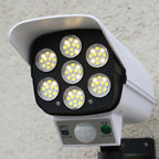 Foco De Luz Solar Tipo Cámara De Seguridad Sensor + Control Blanco
