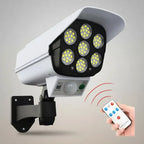 Foco De Luz Solar Tipo Cámara De Seguridad Sensor + Control Blanco
