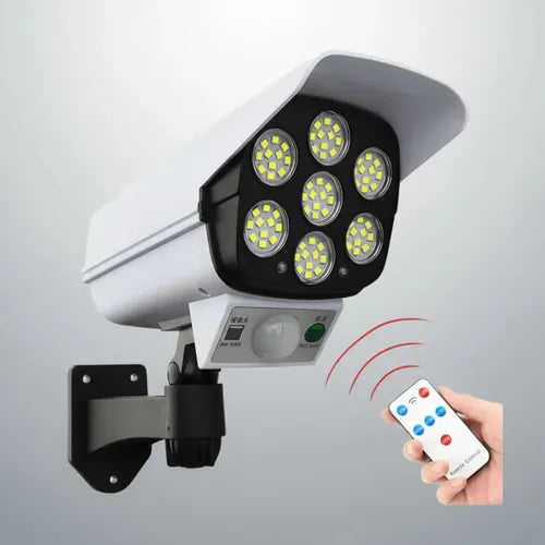 Foco De Luz Solar Tipo Cámara De Seguridad Sensor + Control Blanco